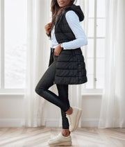 Women's long hooded puffer vest, view 3 - MRSLM