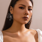 Vintage gold-toned hollow flower stud earrings, view 4 - MRSLM