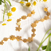 gold plated asymmetrical daisy earrings, view 4 - MRSLM