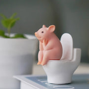cartoon pig sitting on toilet desktop ornament, view 5 - MRSLM