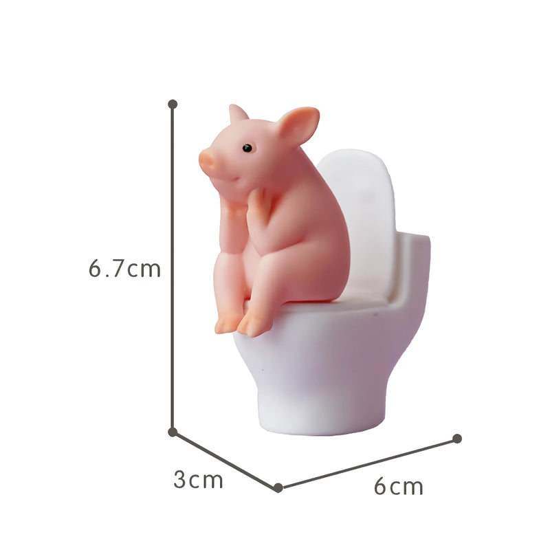 cartoon pig sitting on toilet desktop ornament, view 6 - MRSLM