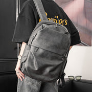 simple gray men's backpack, view 3 - MRSLM