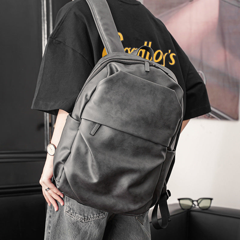 simple gray men's backpack, view 3 - MRSLM