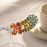resin twist hoop earrings, view 9 - MRSLM