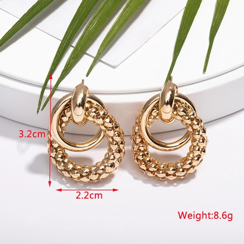 gold metal twist dangle earrings, view 2 - MRSLM