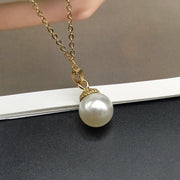 shell and imitation pearl pendant necklace, view 2 - MRSLM