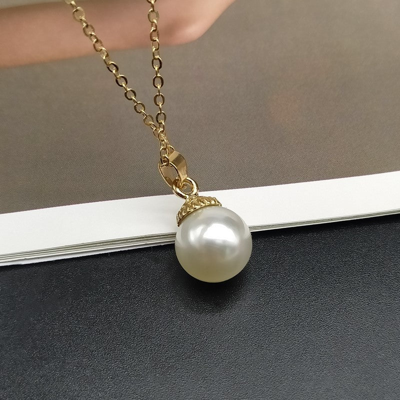 shell and imitation pearl pendant necklace, view 2 - MRSLM