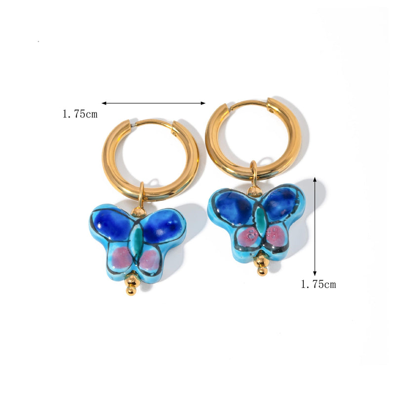 Blue flower butterfly stud earrings, view 2 - MRSLM