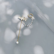 gold flower ear clip, view 2 - MRSLM