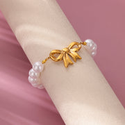 gold bowknot bracelet with imitation pearls, view 3 - MRSLM