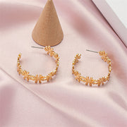 golden C-shaped flower drop earrings, view 7 - MRSLM