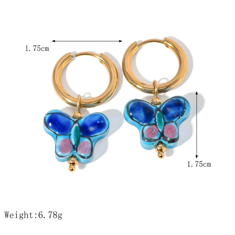 Blue flower butterfly stud earrings, view 6 - MRSLM