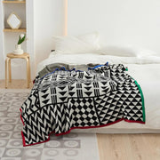geometric pattern cotton blanket with stripe edge, view 4 - MRSLM