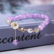 purple beaded white flower bracelet - MRSLM