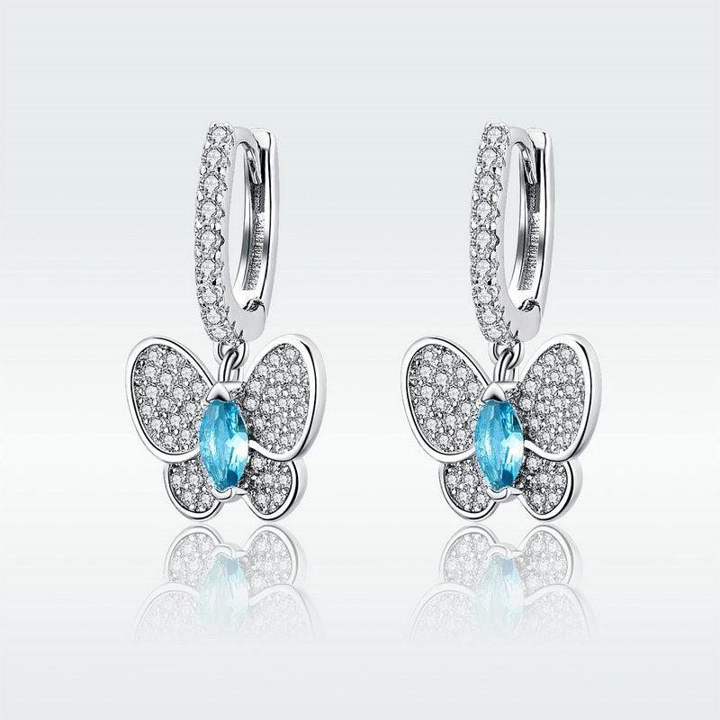 blue crystal bow stud earrings - MRSLM