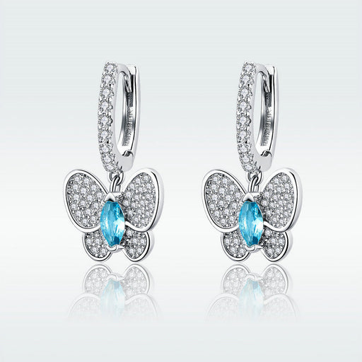 blue crystal bow stud earrings - MRSLM