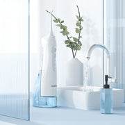 rechargeable water flosser with 4 nozzles, view 4 - MRSLM