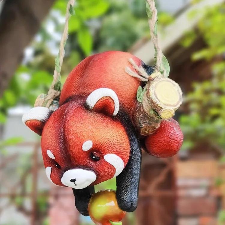 Resin raccoon statue climbing rope, view 5 - MRSLM