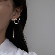 gold flower ear clip, view 3 - MRSLM