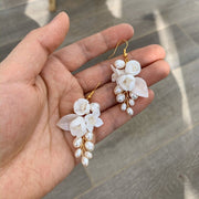 white ceramic flower ear hook earrings, view 3 - MRSLM