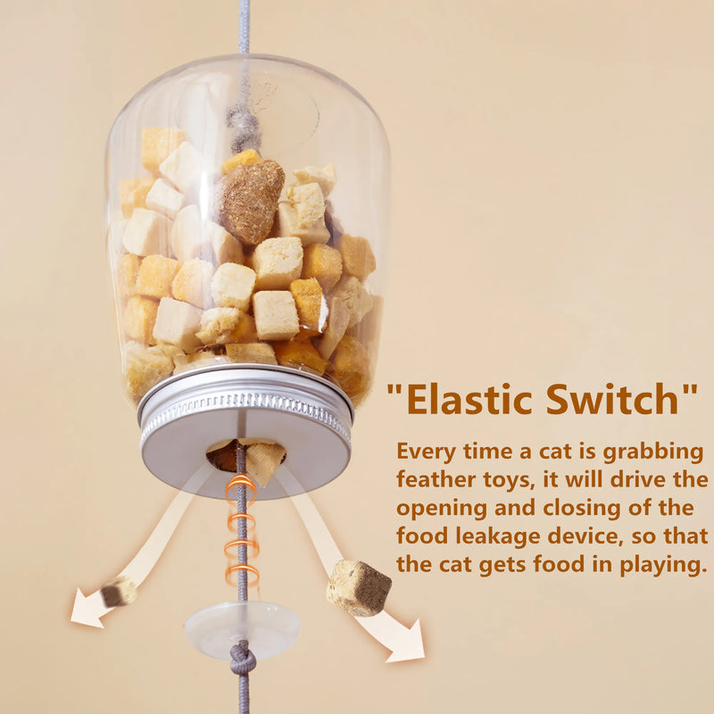 interactive cat toy food dispenser with feather and bell, view 3 - MRSLM
