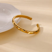 handmade gold-tone geometric cuff bracelet, view 6 - MRSLM