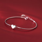 Women's glossy heart sterling silver bracelet, view 4 - MRSLM