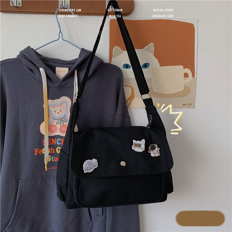 canvas cross-body messenger bag, view 3 - MRSLM