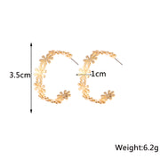 golden C-shaped flower drop earrings, view 2 - MRSLM