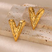 gold heart stud earrings, view 7 - MRSLM