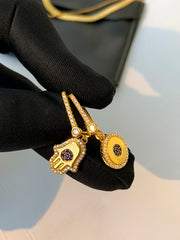 evil eye asymmetrical earrings, view 5 - MRSLM