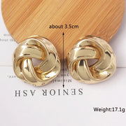 Gold spiral drop earrings, view 3 - MRSLM