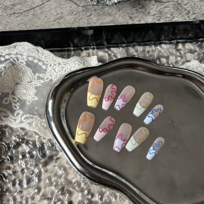 hand-worn flower nails, view 4 - MRSLM