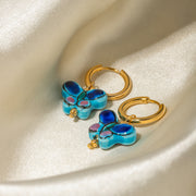 Blue flower butterfly stud earrings, view 4 - MRSLM