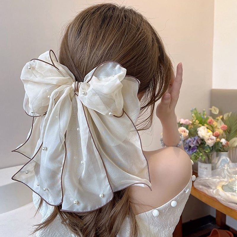 bow hair clip, view 3 - MRSLM