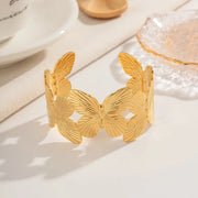 gold butterfly bracelet, view 3 - MRSLM