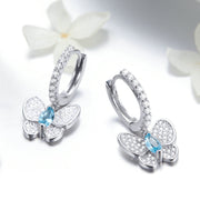 blue crystal bow stud earrings, view 4 - MRSLM