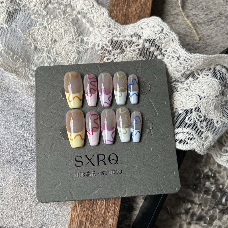 hand-worn flower nails, view 3 - MRSLM