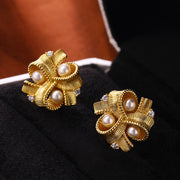 women's pearl ribbon stud earrings - MRSLM