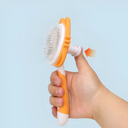 self-cleaning pet grooming brush, view 7 - MRSLM