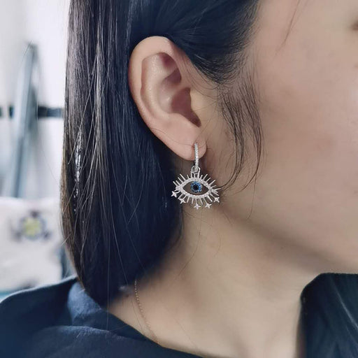 silver evil eye earrings - MRSLM