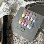hand-worn flower nails, view 2 - MRSLM