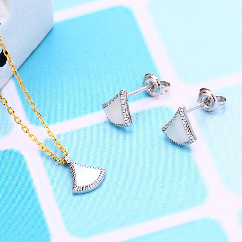 white shell skirt stud earrings, view 5 - MRSLM