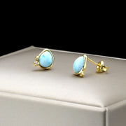 white topaz wave stud earrings, view 2 - MRSLM