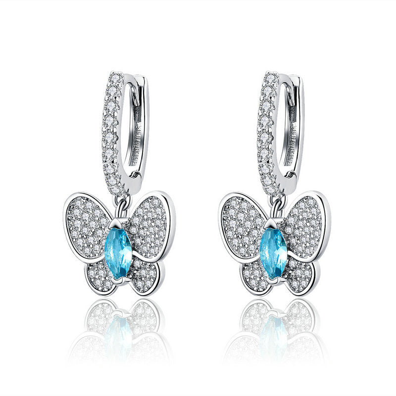 blue crystal bow stud earrings, view 5 - MRSLM