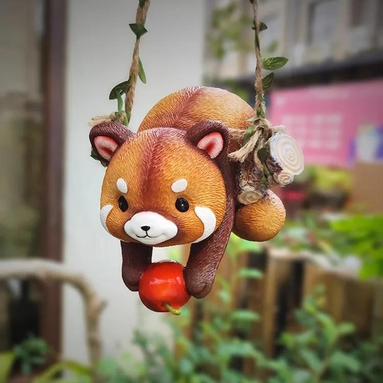 Resin raccoon statue climbing rope, view 6 - MRSLM