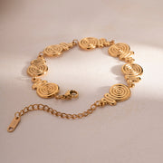 18K gold swirl circle bangle, view 6 - MRSLM