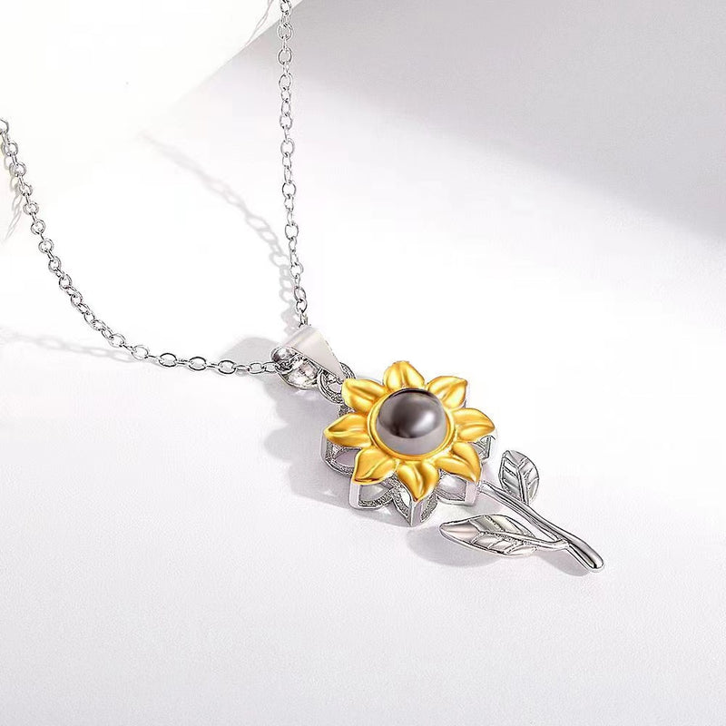 women's silver sunflower necklace, view 5 - MRSLM
