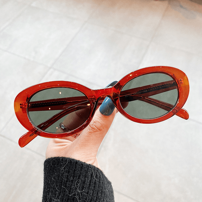 women's small frame oval sunglasses, view 9 - MRSLM