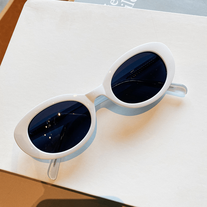 women's small frame oval sunglasses, view 3 - MRSLM
